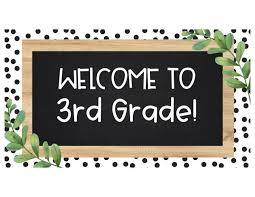 Welcome to 3rd Grade at JFK Catholic School with chalkboard sign and greenery.