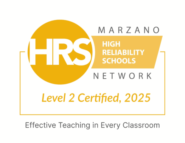 JFK Catholic School logo with High Reliability Schools certification and Level 2, 2025.
