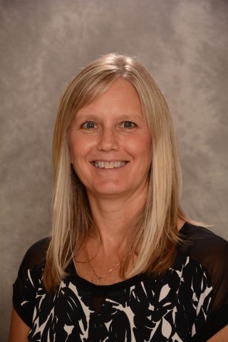 Portrait of Shelly Furlong, Fourth Grade teacher at JFK Catholic School.