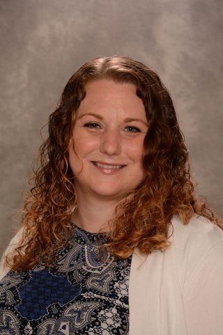Portrait of Angie Maxwell, a second-grade student at JFK Catholic School.